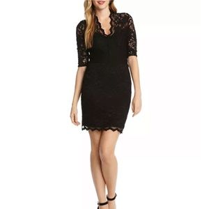 Quarter sleeve, lace, black cocktail dress.